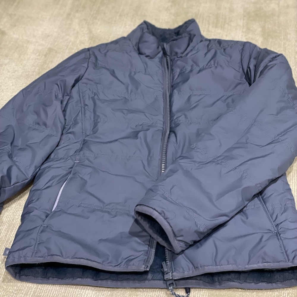 Warm and fuzzy girl’s Athleta reversible blue jacket